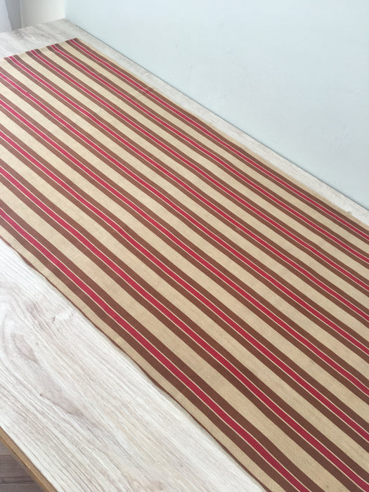 Swedish ticking in brown and red stripes. c.1900 - 55 cm × 2 meters