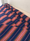 Swedish ticking in denim blue, orange, red, and thin white stripes. c.1940 - 94 cm × 3.3 meters