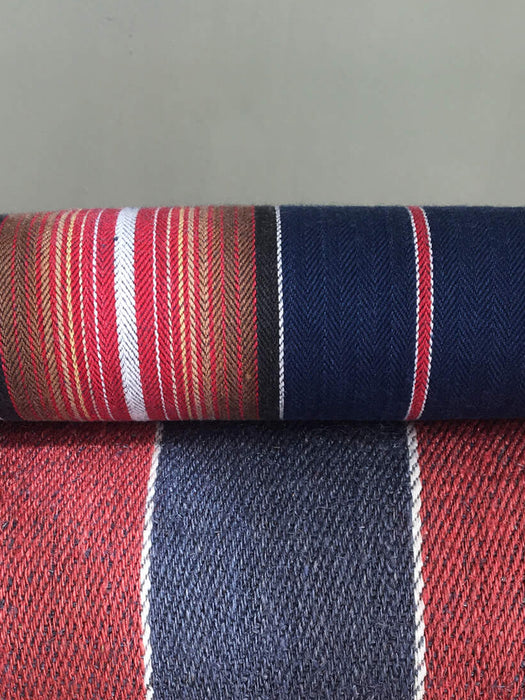 Swedish ticking in denim blue, orange, red, and thin white stripes. c.1940 - 94 cm × 3.3 meters