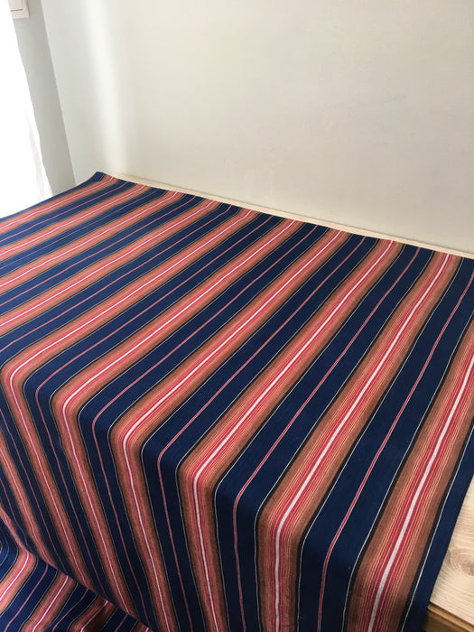 Swedish ticking in denim blue, orange, red, and thin white stripes. c.1940 - 94 cm × 3.3 meters