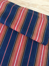 Swedish ticking in denim blue, orange, red, and thin white stripes. c.1940 - 94 cm × 3.3 meters