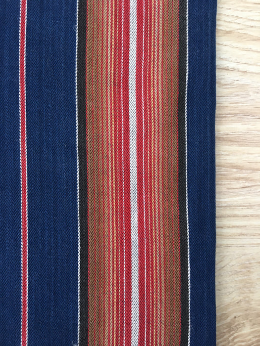 Swedish ticking in denim blue, orange, red, and thin white stripes. c.1940 - 94 cm × 3.3 meters