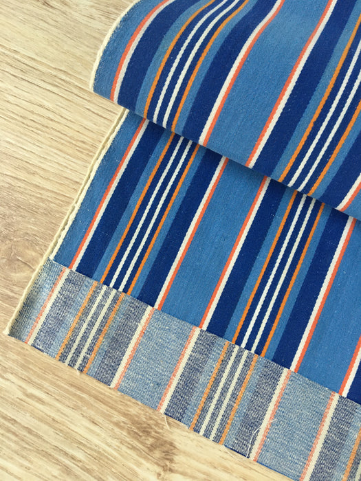 Denim blue, orange, red, and thin white stripes ticking. Sweden c.1940 - 70 cm × 4 meters 
